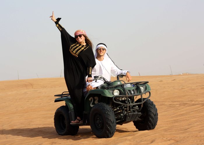 Quad Biking Dubai Couple Enjoying